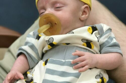 Newborn Preemie With Natursutten Natural Rubber Pacifier and Bee Outfit From Cat & Dogma